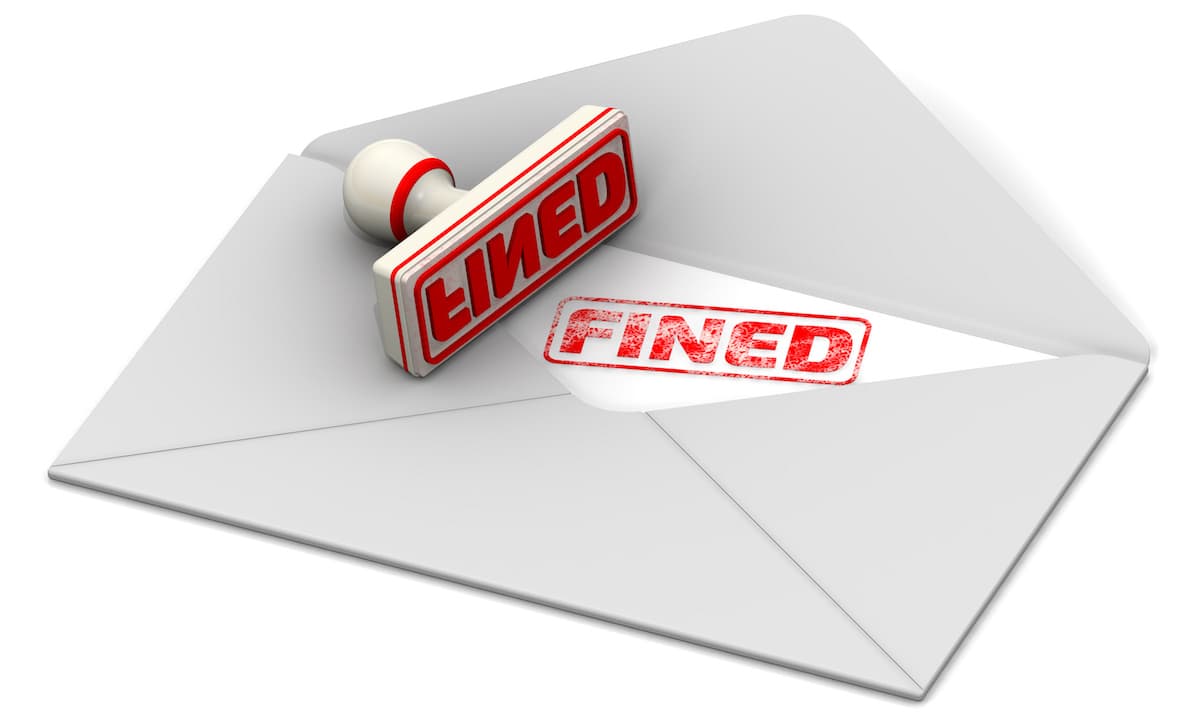 inside of letter that reads stamped caption FINED