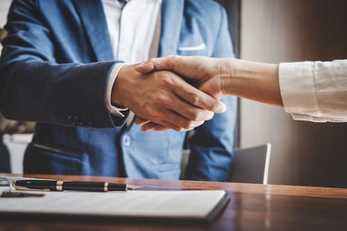 insurance agent with policyholder