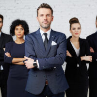 Bad faith lawyer standing in front of pack of lawyers