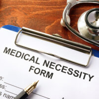 Medical Necessity form on a table.