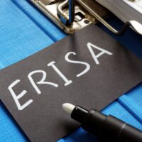 Text sign showing hand written words ERISA