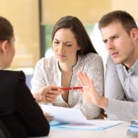 Customers rejecting contract at office Customers rejecting contract at office