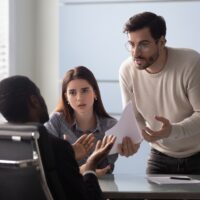 Angry young male customer dissatisfied with contract terms of conditions. Angry young male customer dissatisfied with contract terms of conditions.