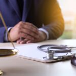 Law gavel stethoscope Health care business rules Law gavel stethoscope Health care business rules