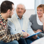 Elderly couple and insurance agent